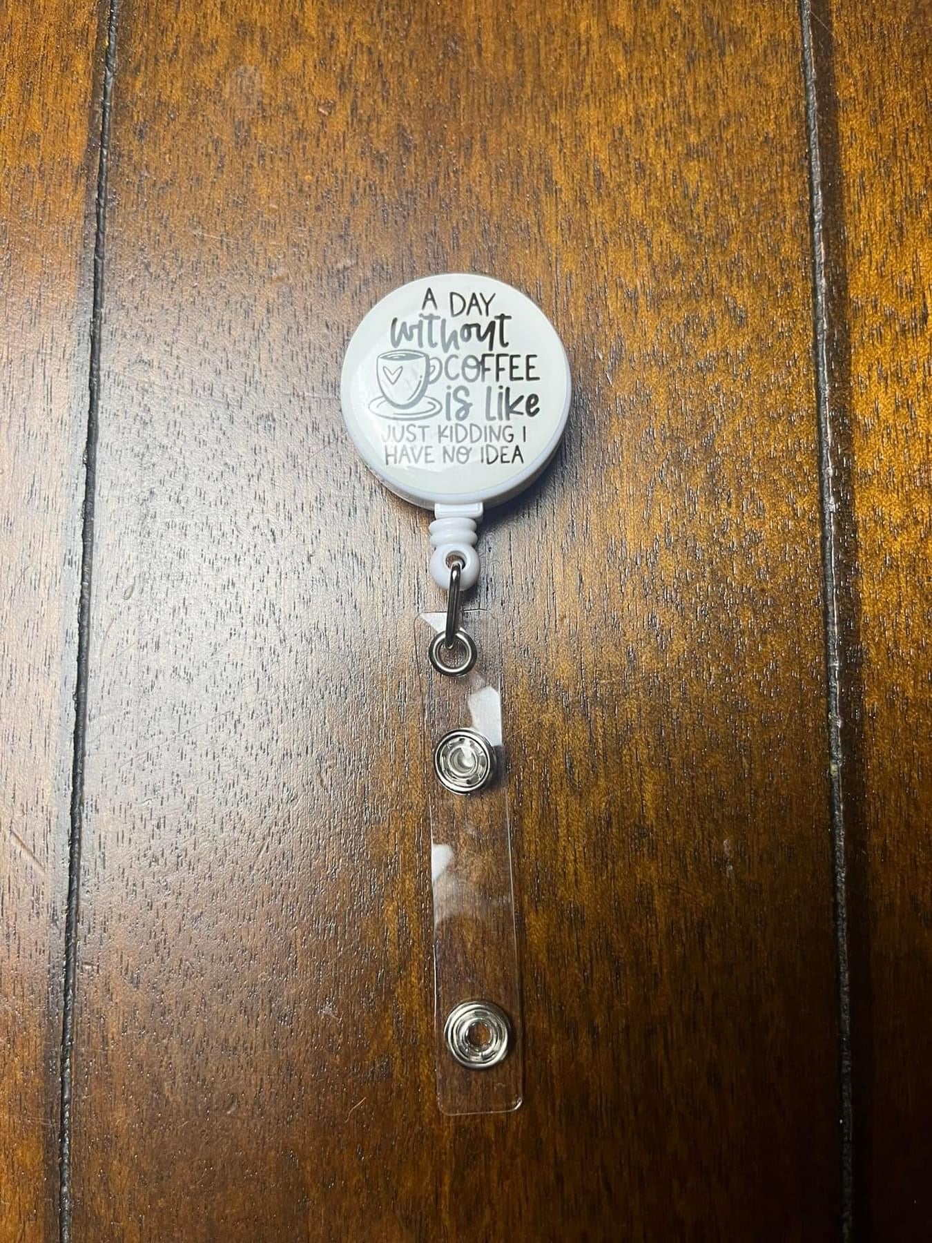 A Day Without Coffee Badge Holder