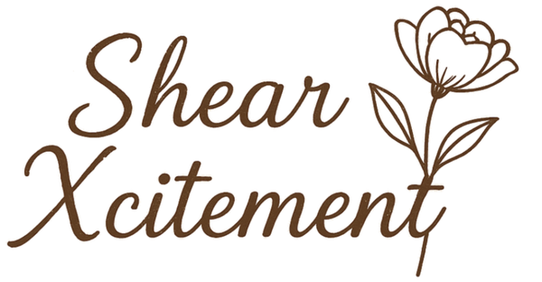 Decorative text 'Shear Xcitement' with a flower illustration on a white background